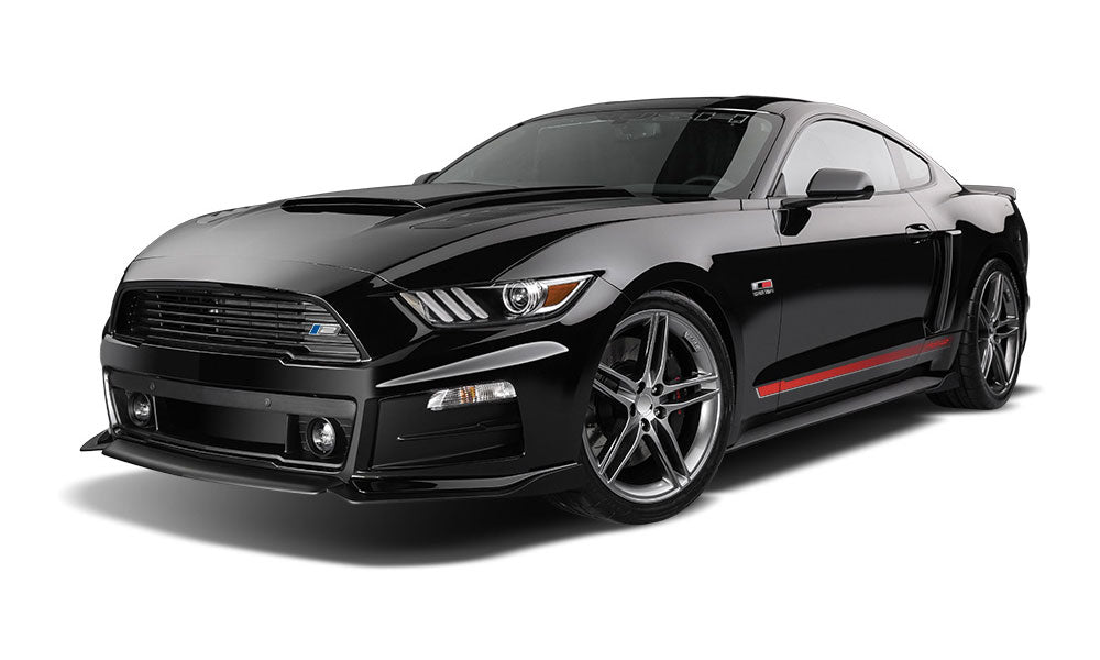 A black ROUSH Stage 2 Mustang sports car with a sleek design, boasting V8 power, silver alloy wheels, red accent stripes on the side, and an Active Performance Exhaust System.