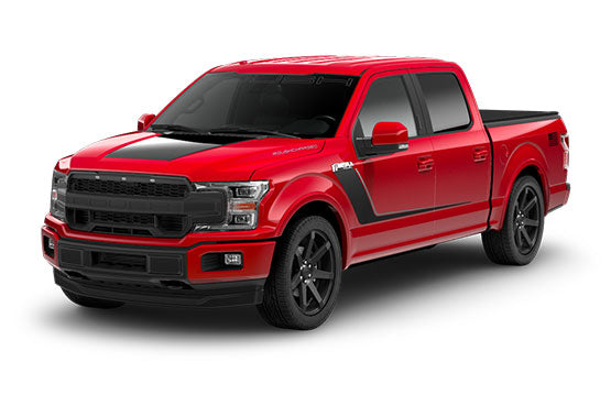 Red pickup truck with black accents and a ROUSH Performance touch, boasting tinted windows and alloy wheels, viewed from the front right angle.