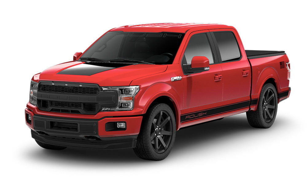 The ROUSH F-150 Sport is a red pickup truck with black accents, featuring four doors and large wheels. With its sporty design and an Active Exhaust System, it delivers an exhilarating drive that stands out on any road.