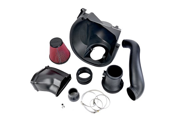 A variety of black plastic components and a red air filter are arranged on a white background, showcasing an EcoBoost Cold Air Kit designed for increased performance in your Roush Mustang.