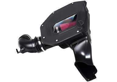 A black automotive air intake system designed for the Mustang 5.0L, featuring a visible red air filter and elegantly curved tubing.