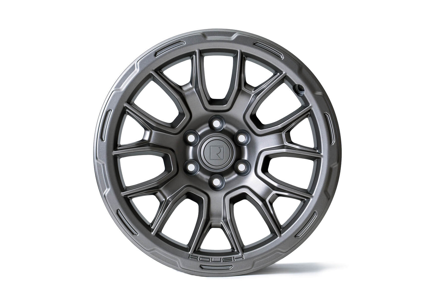 Introducing the 20-inch Roush F-150 wheels in a sleek Iridium Grey finish, showcasing a silver alloy wheel with a multi-spoke design. It features a central logo and the word "Rogue" elegantly placed at the bottom, perfect for those seeking style and performance.