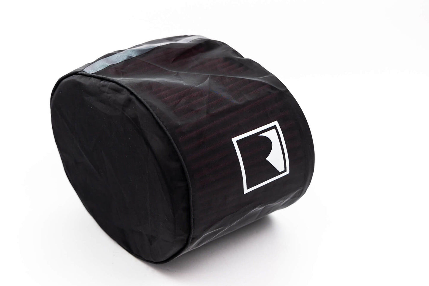 A black, cylindrical fabric cover with a white logo depicting a stylized "Roush Bronco Air Induction System" on it. The cover appears to be designed for protecting or storing a round object.