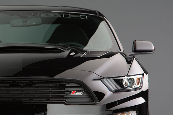 
                  
                    Front view of a sleek black car with a prominent grille and an emblem reading "B3," set against a plain background, exuding the raw power reminiscent of the 2016 Stage 3 Mustang by ROUSH Performance, boasting an impressive 670HP.
                  
                