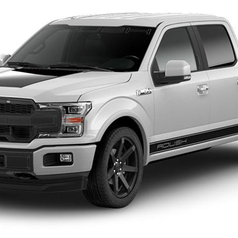 The ROUSH F-150 Sport is a striking white pickup truck with black accents on the hood and sides, complemented by dark wheels and tinted windows. Its ROUSH Performance Exhaust System ensures an exhilarating drive.