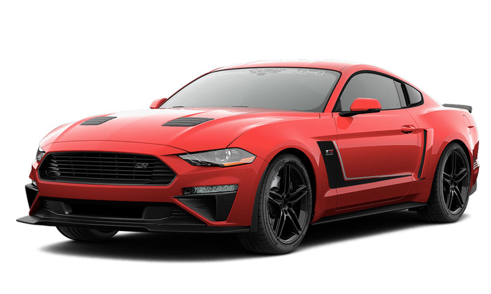 A red supercharged Mustang with black accents, boasting a wide front grille and sleek headlights, parked at an angle against a plain white background. This ROUSH JackHammer delivers an impressive 710 horsepower.