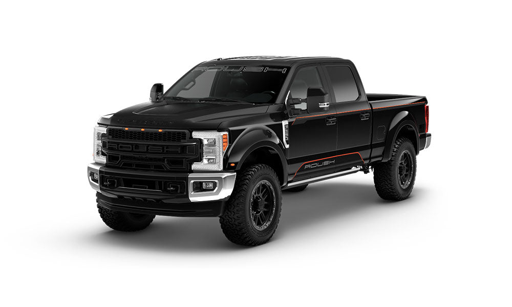 Black ROUSH Super Duty pickup truck with "Roush" branding, boasting performance off-road tires and a sporty design, enhanced with impressive towing capabilities.