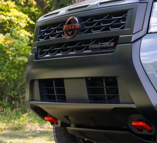 Titanium-painted off-road skid plate and lower front fascia for protection and contrast