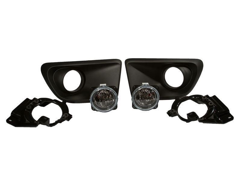 A set of Mustang Fog Light Kit assemblies, including two fog lights, two black mounting brackets, and two bezel covers crafted from durable Injection Molded TPO.