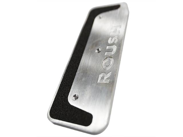 
                  
                    Close-up of a Roush Performance Pedal Kit cover, crafted from billet aluminum, with "ROUSH" engraved on it and a black non-slip surface—perfect for your manual transmission Mustang.
                  
                