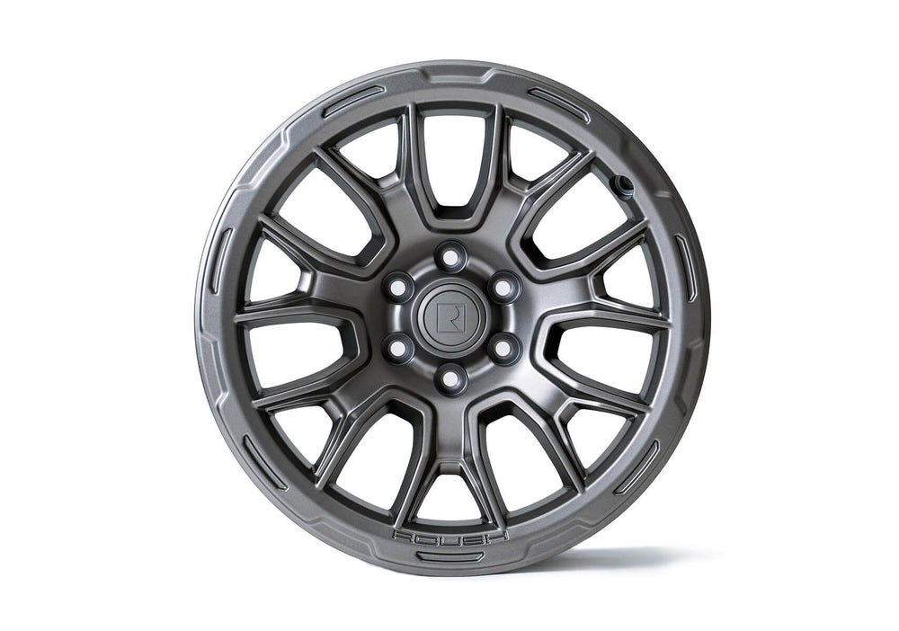 Introducing the 20-inch Roush F-150 wheels in a sleek Iridium Grey finish, showcasing a silver alloy wheel with a multi-spoke design. It features a central logo and the word 