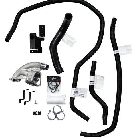An assortment of automotive parts, including hoses, clamps, a metal bracket, and a turbocharger component from the 2021-2023 Ford F-150 Roush Supercharger, arranged on a pristine white background.