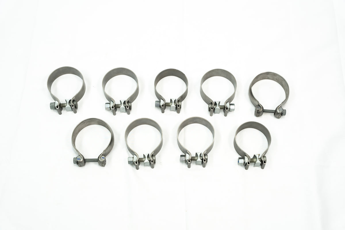 
                  
                    Ten metal hose clamps with bolts—ideal for securing components of a Roush F-150 cat-back exhaust or rear-exit exhaust system—are arranged in two rows on a white background.
                  
                