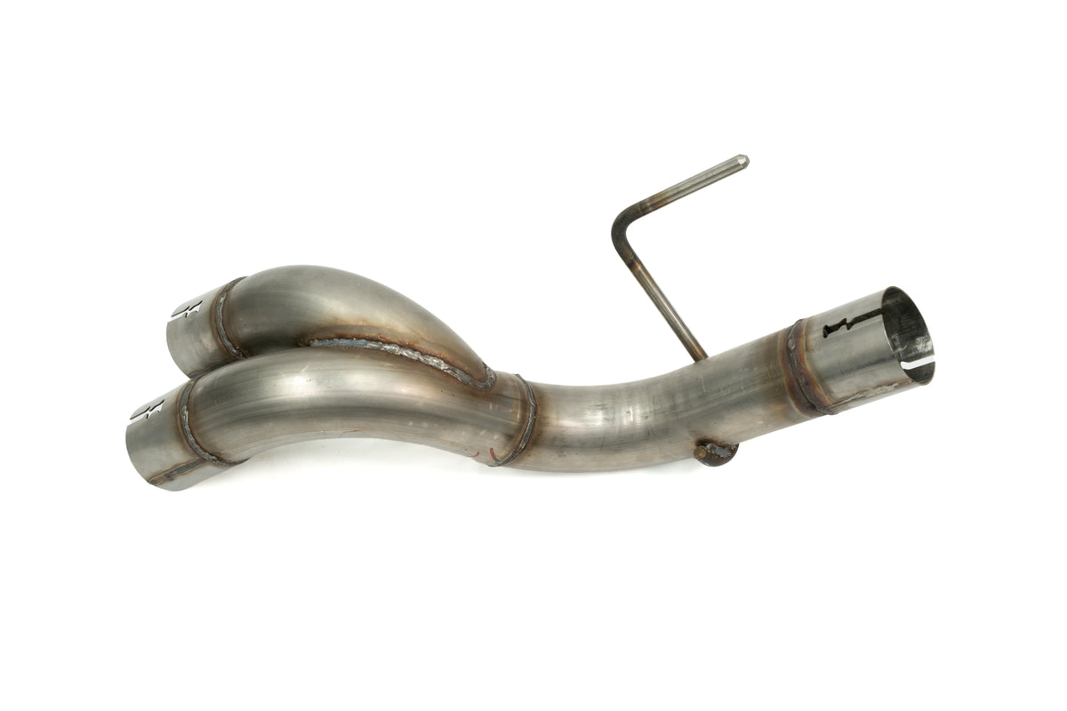 
                  
                    A metal automotive exhaust pipe with a Y-shaped split and welded seams, featuring a bent hanger rod attached near one end, designed for integration with a rear-exit exhaust system.
                  
                