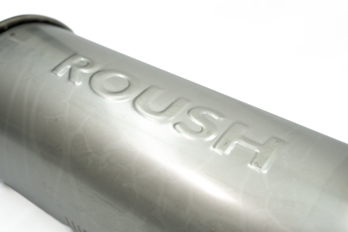 
                  
                    Metallic Roush performance muffler with the word “ROUSH” embossed on the side.
                  
                