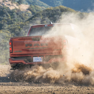 Balances off-road capability with on-road comfort by reducing harshness and improving control over rough terrain.