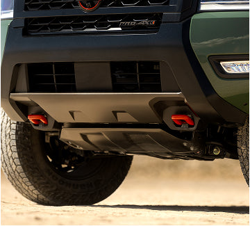 Titanium-painted off-road skid plate and lower front fascia for protection and contrast